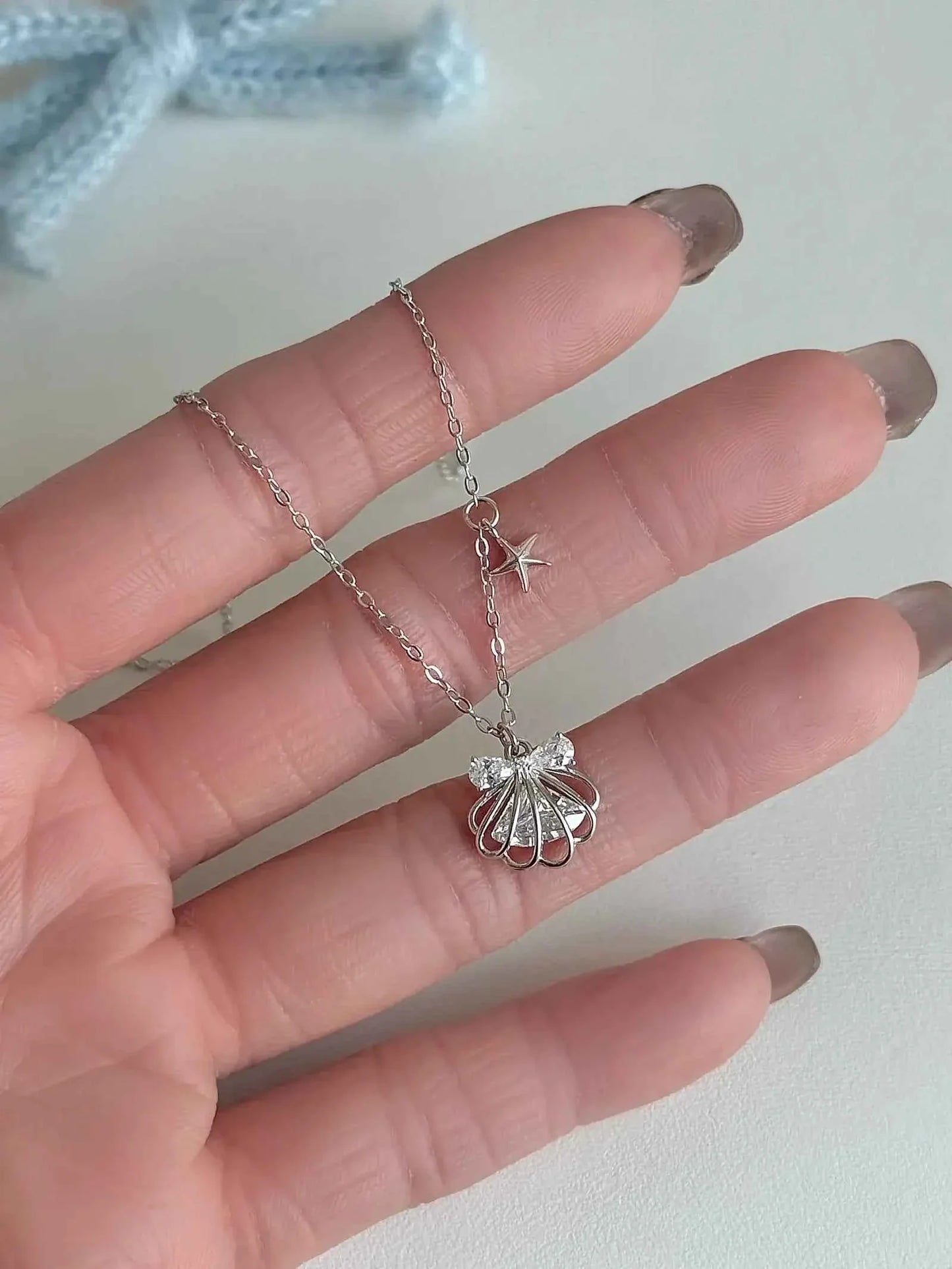 "Silken Star Kiss" 925 Sterling Silver White Gold-Plated Shell Necklace - Delicate, Elegant, and Sparkling.