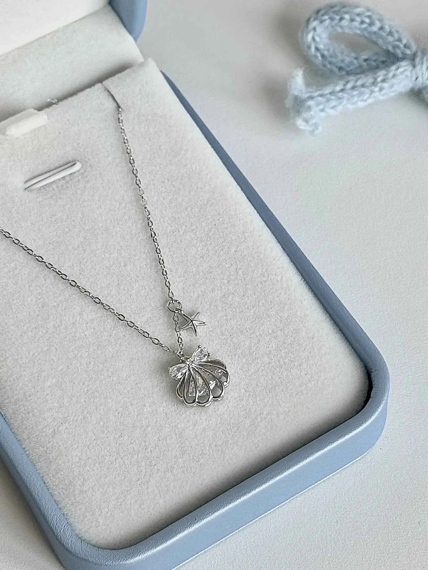 "Silken Star Kiss" 925 Sterling Silver White Gold-Plated Shell Necklace - Delicate, Elegant, and Sparkling.