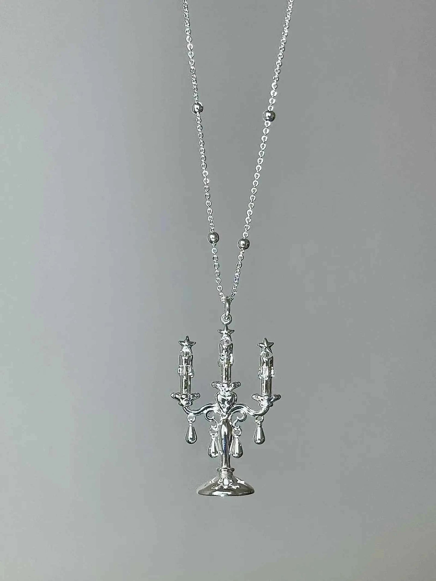 "Starlight Candlestick" Vintage Star Necklace - Unique, Elegant, and Long Chain Design.