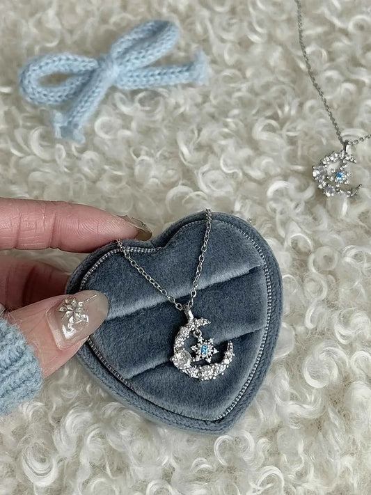 "Snow Dance Moonlight" 925 Sterling Silver Blue Diamond Snowflake Necklace - Cool Elegance and Gentle Charm.