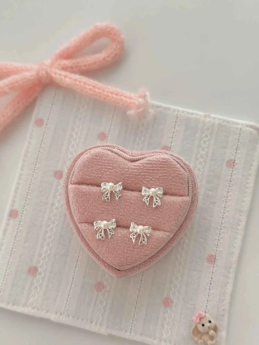 "Venus' Gift" 999 Pure Silver Hollow Bowknot Pearl Stud Earrings - Elegant, Refined, and Unique.