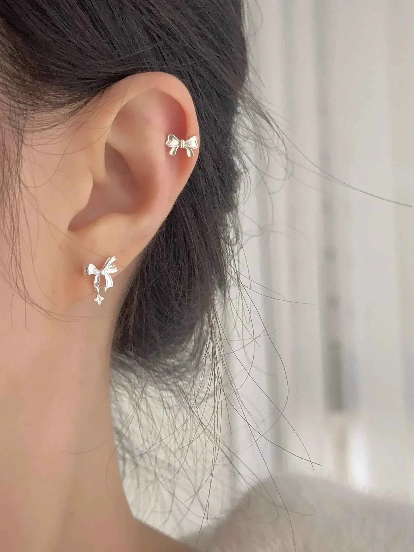 "Ballet Skirt" 999 Pure Silver Hollow Bowknot and Star Stud Earrings - Graceful, Delicate, and Unique.