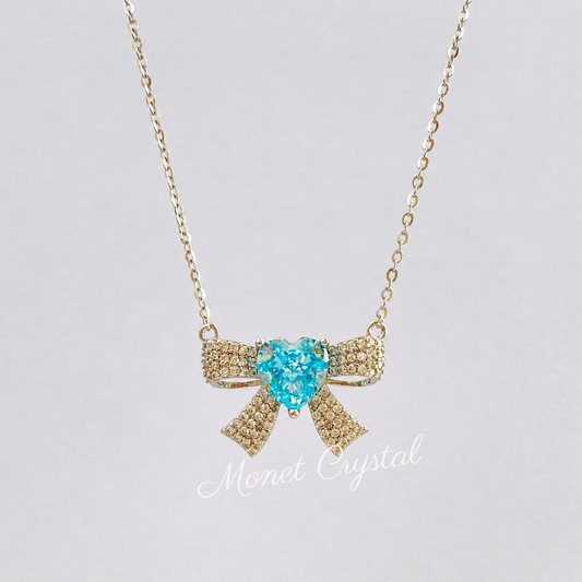 “Blue Bow Éclat” S925 Sterling Silver Ice-Cut Blue Heart Bow Necklace