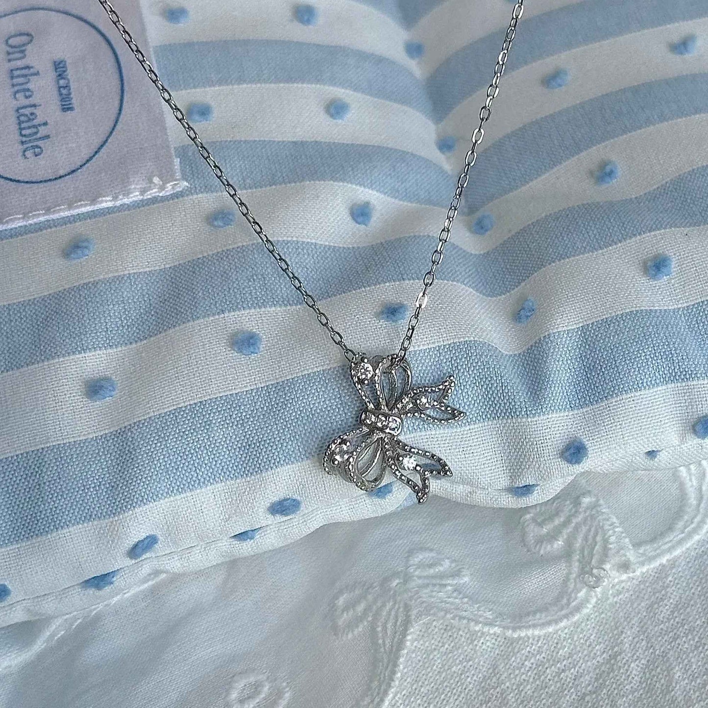 "First Heartbeat" 925 Sterling Silver Bow Necklace – Petite Sparkle, Big Romance