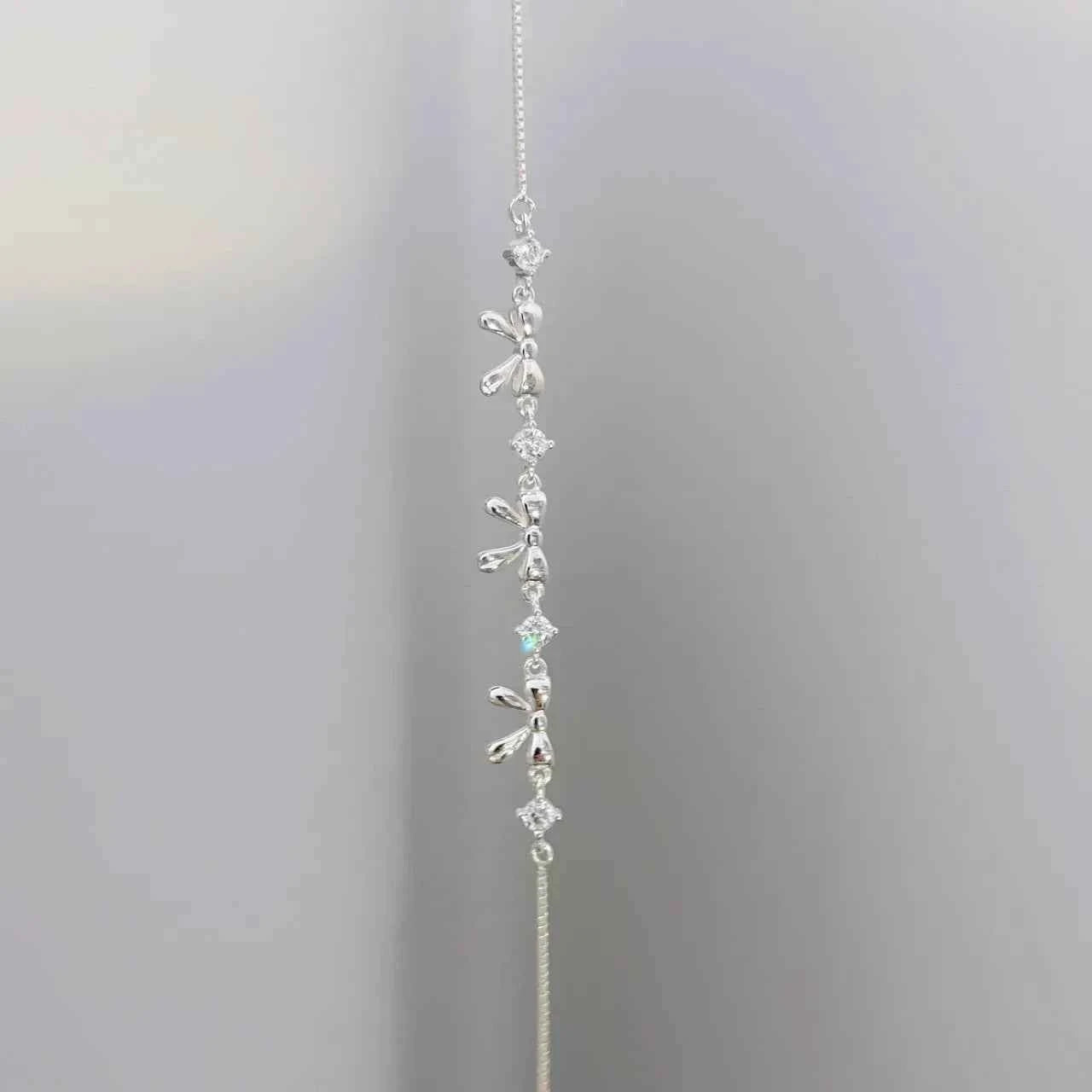 "Korean Bow" 925 Sterling Silver Bow Bracelet with Zircon – Sweet & Shimmering