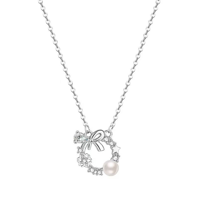 "Lucky Garland" 925 Sterling Silver Bow and Snowflake Necklace - Elegant and Unique