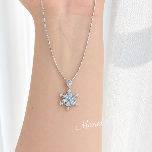“Snow Waltz” S925 Sterling Silver Rotating Snowflake Blue Zircon Necklace