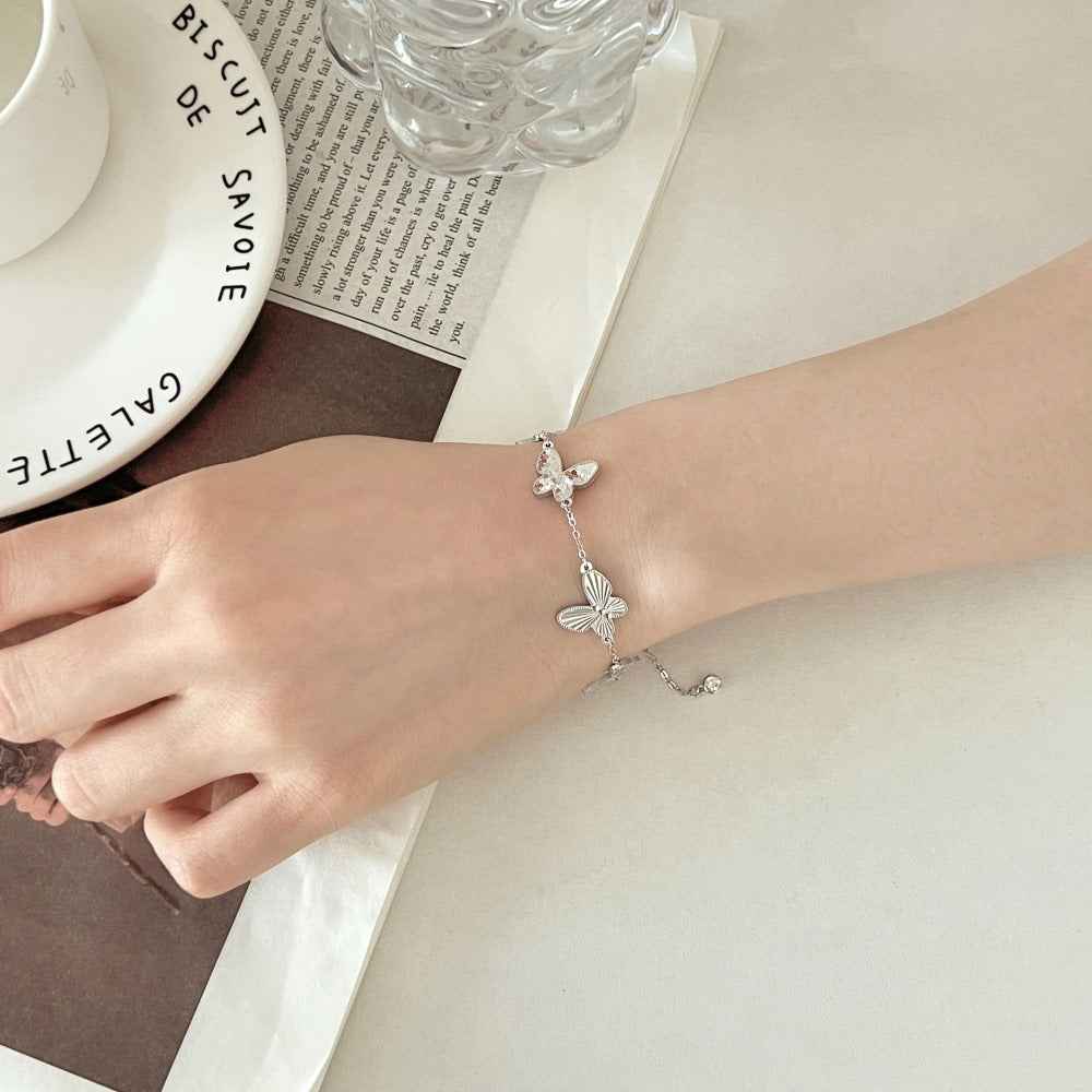 "Wings of Twilight" 925 Sterling Silver Butterfly Bracelet – Dual-Faced Elegance (Copy)