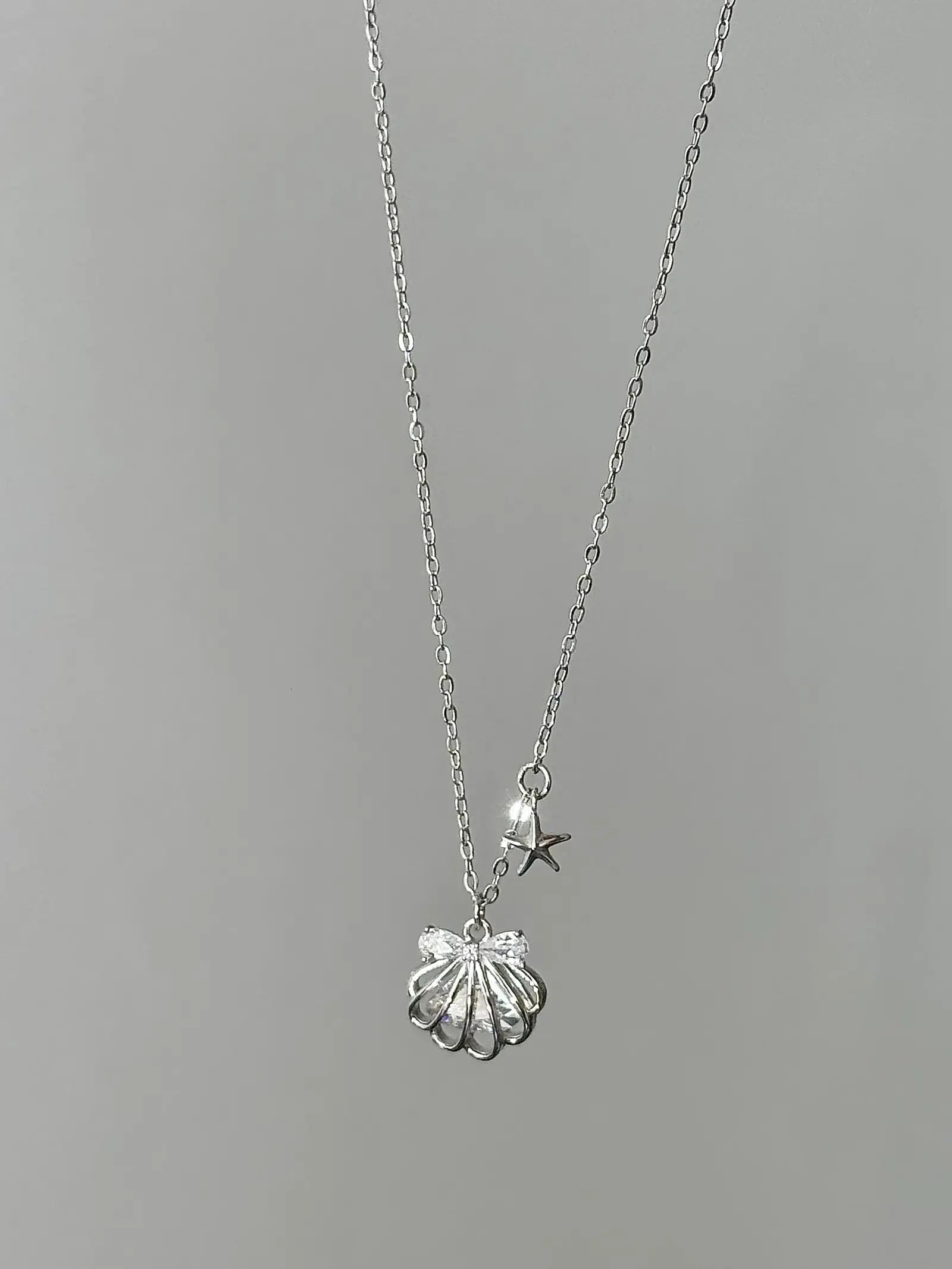 "Silken Star Kiss" 925 Sterling Silver White Gold-Plated Shell Necklace - Delicate, Elegant, and Sparkling.