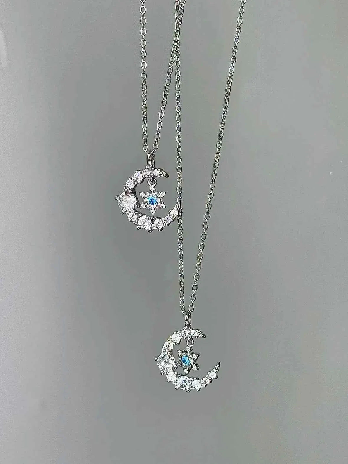 "Snow Dance Moonlight" 925 Sterling Silver Blue Diamond Snowflake Necklace - Cool Elegance and Gentle Charm.