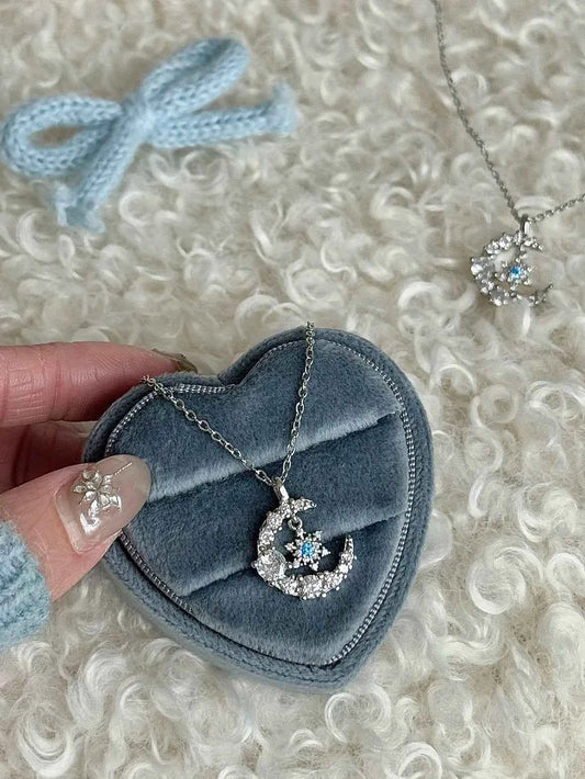 "Snow Dance Moonlight" 925 Sterling Silver Blue Diamond Snowflake Necklace - Cool Elegance and Gentle Charm.