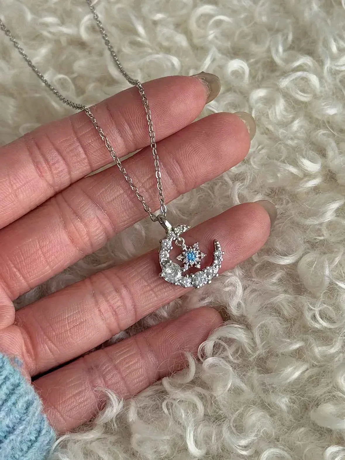 "Snow Dance Moonlight" 925 Sterling Silver Blue Diamond Snowflake Necklace - Cool Elegance and Gentle Charm.