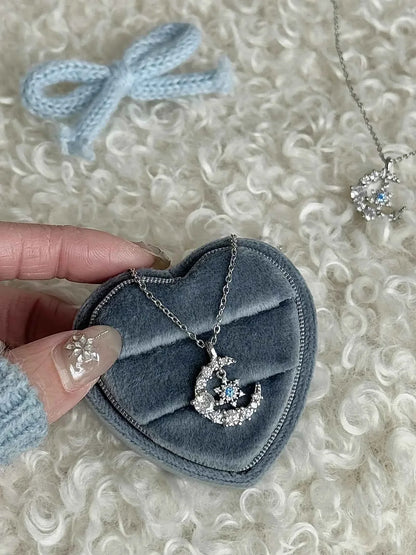 "Snow Dance Moonlight" 925 Sterling Silver Blue Diamond Snowflake Necklace - Cool Elegance and Gentle Charm.