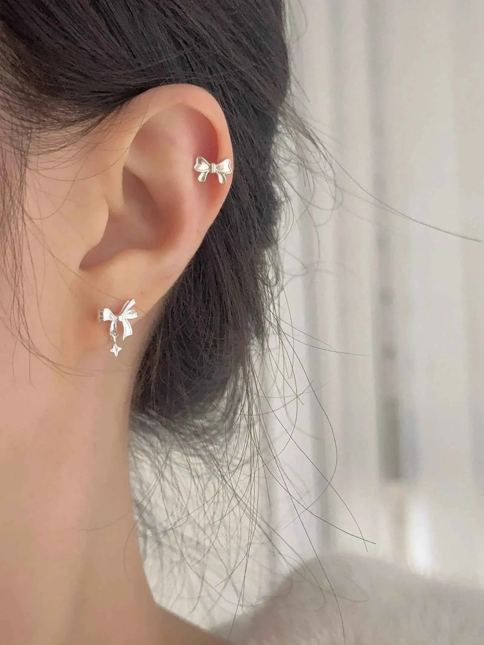 "Ballet Skirt" 999 Pure Silver Hollow Bowknot and Star Stud Earrings - Graceful, Delicate, and Unique.