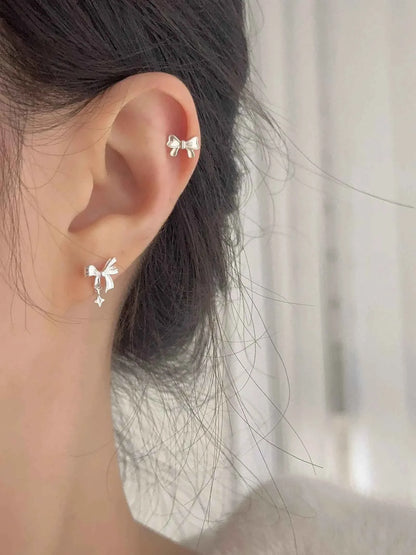 "Ballet Skirt" 999 Pure Silver Hollow Bowknot and Star Stud Earrings - Graceful, Delicate, and Unique.