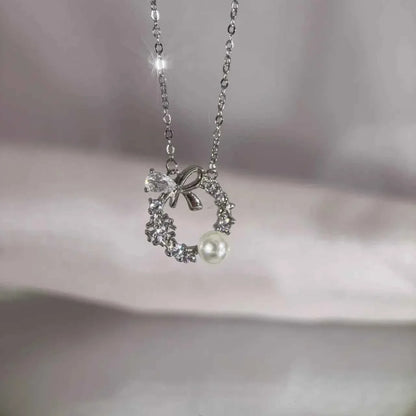 "Lucky Garland" 925 Sterling Silver Bow and Snowflake Necklace - Elegant and Unique