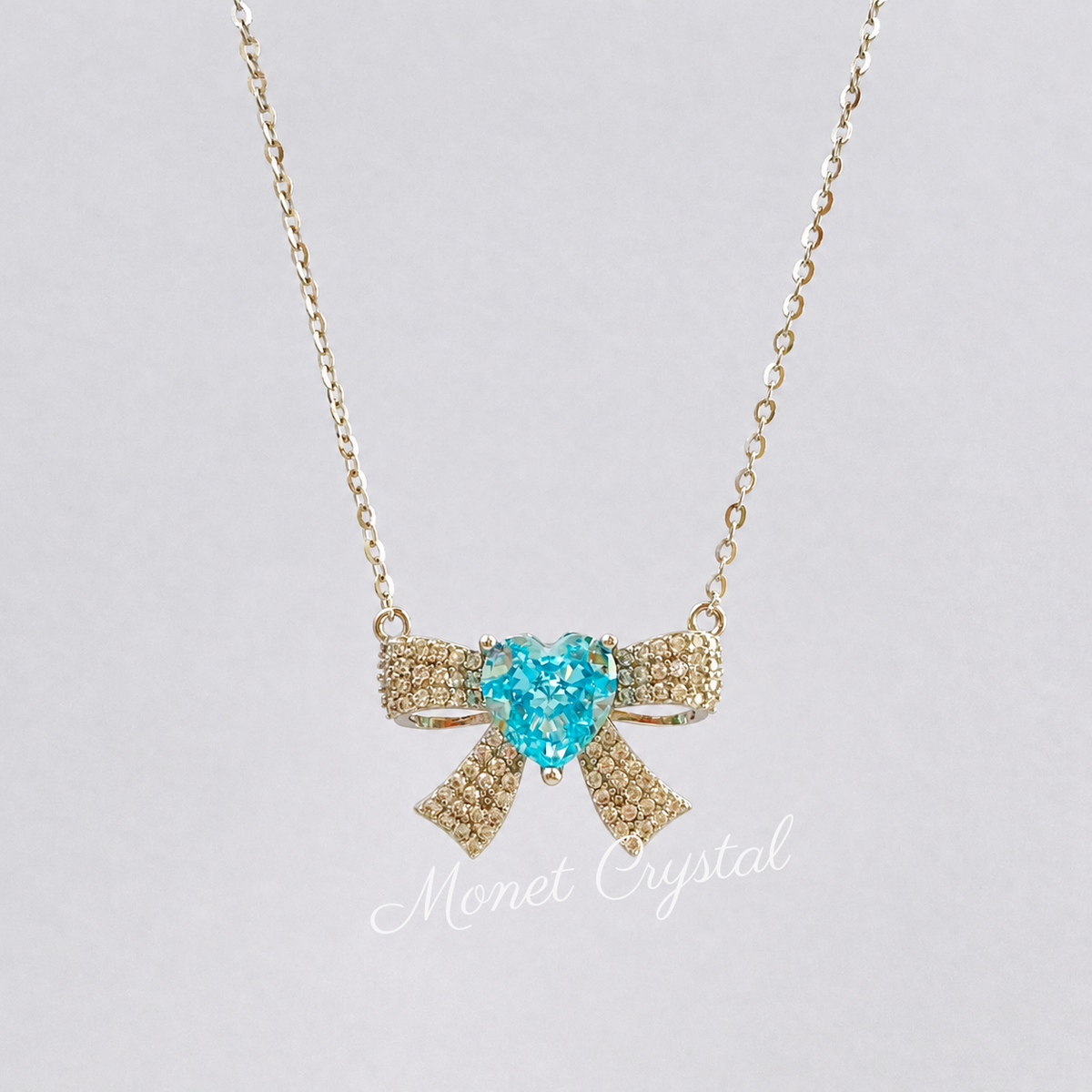 “Blue Bow Éclat” S925 Sterling Silver Ice-Cut Blue Heart Bow Necklace