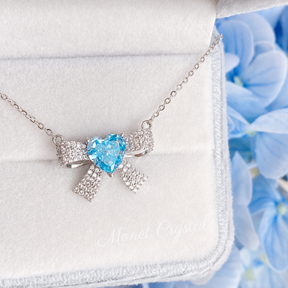 “Blue Bow Éclat” S925 Sterling Silver Ice-Cut Blue Heart Bow Necklace