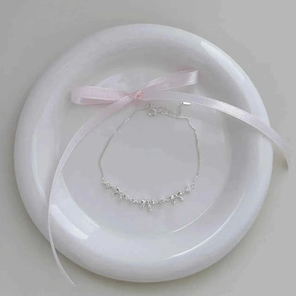 "Korean Bow" 925 Sterling Silver Bow Bracelet with Zircon – Sweet & Shimmering