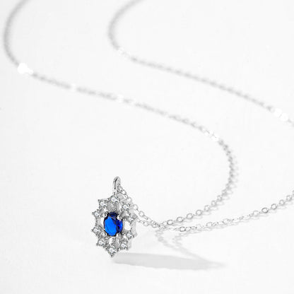 “Royal Solstice” 925 Sterling Silver Sapphire Halo Jewelry Set
