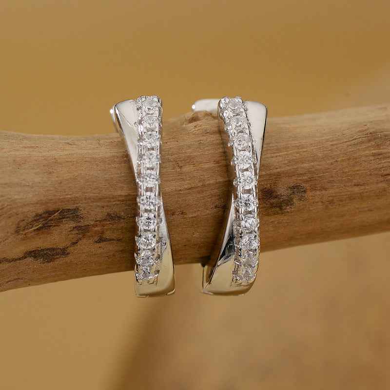 “Luxe Curve” 925 Sterling Silver Pavé Crossover Huggie Earrings