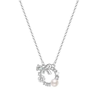 "Lucky Garland" 925 Sterling Silver Bow and Snowflake Necklace - Elegant and Unique