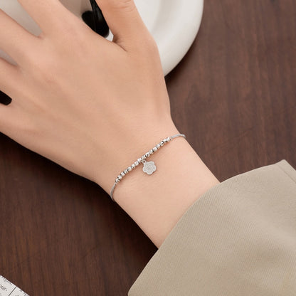 “Blossom Fortune” 925 Sterling Silver Lucky Flower Charm Bracelet