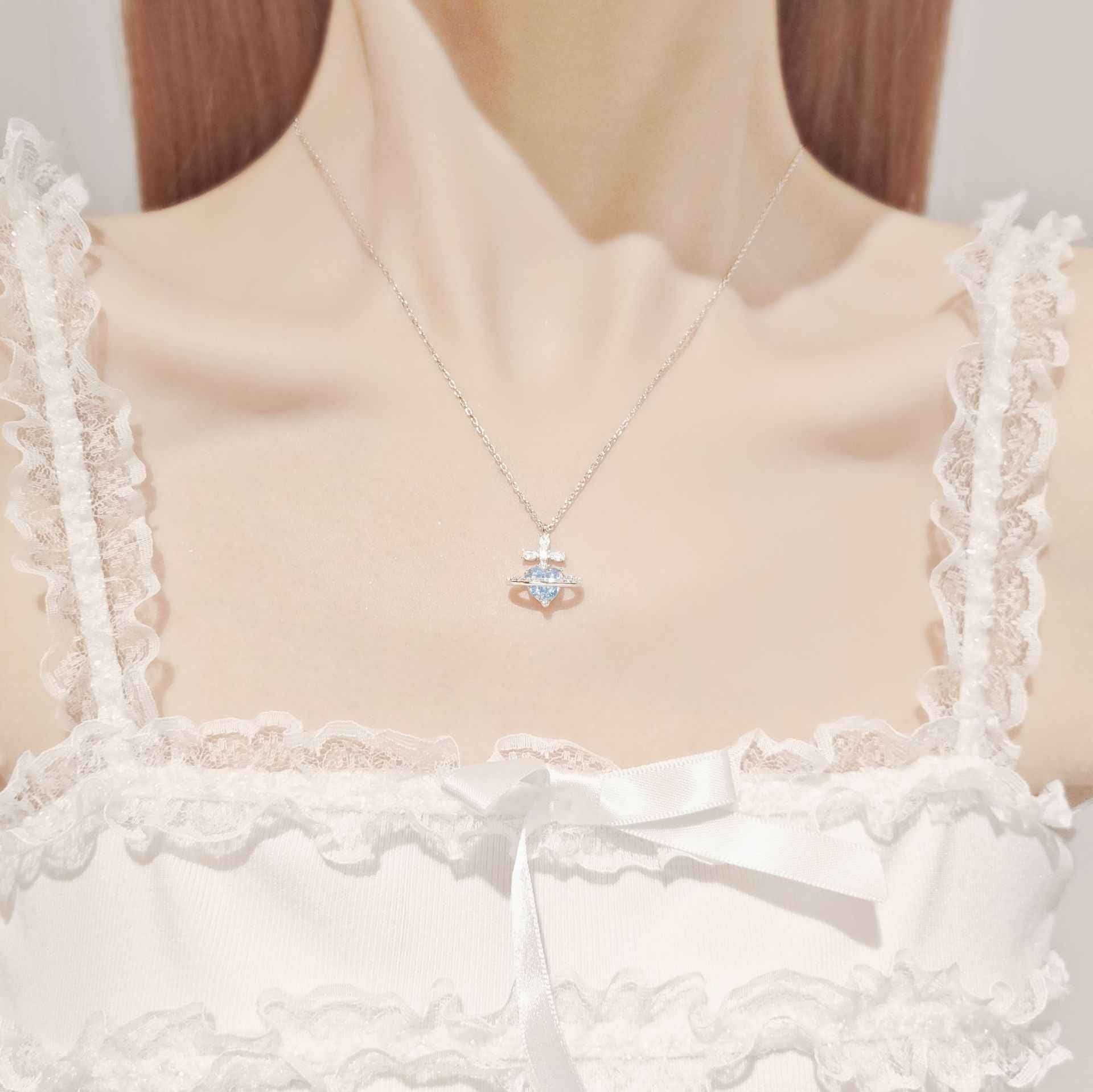“Celestia Orbit” 925 Sterling Silver Saturn Heart Moissanite Necklace