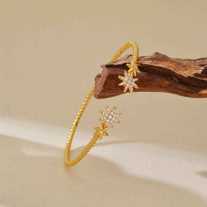 "Celestial Glow" 925 Sterling Silver Starburst Twist Bangle