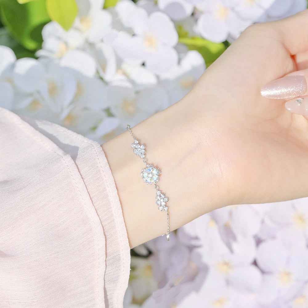 Petal Reverie” 925 Sterling Silver Rotating Sakura Necklace