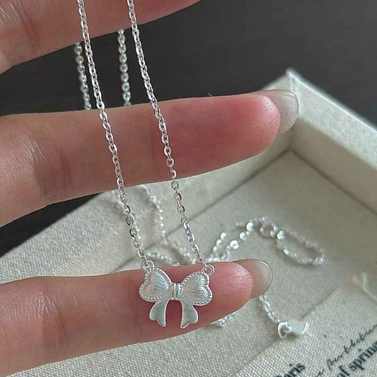 “Ribbon Belle” S925 Sterling Silver Bow Pendant Necklace