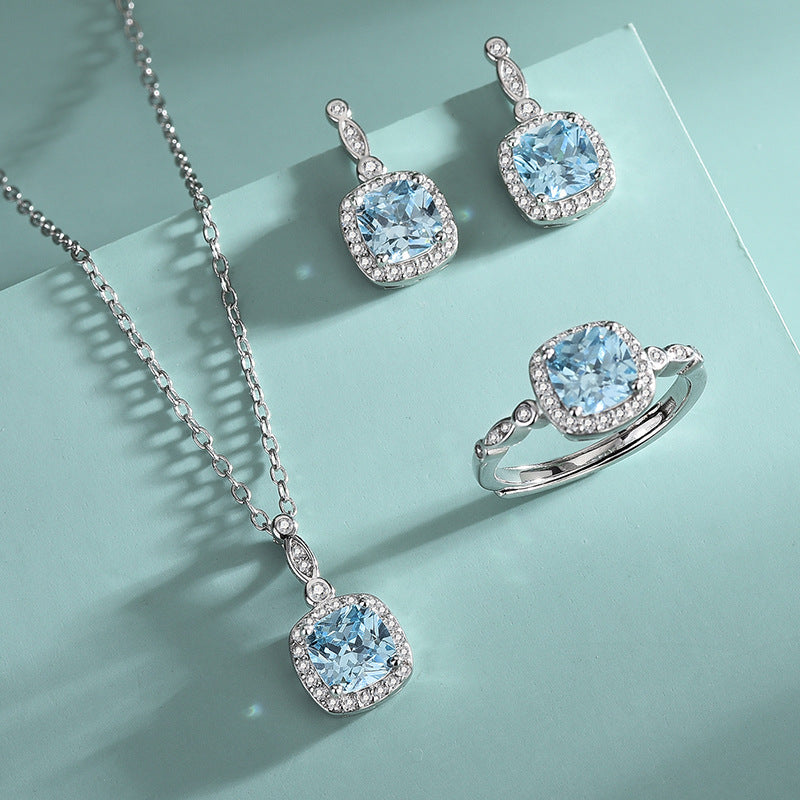 “Ocean Lumière” 925 Sterling Silver Blue Zircon Halo Jewelry Set