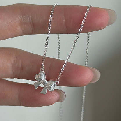 “Ribbon Belle” S925 Sterling Silver Bow Pendant Necklace