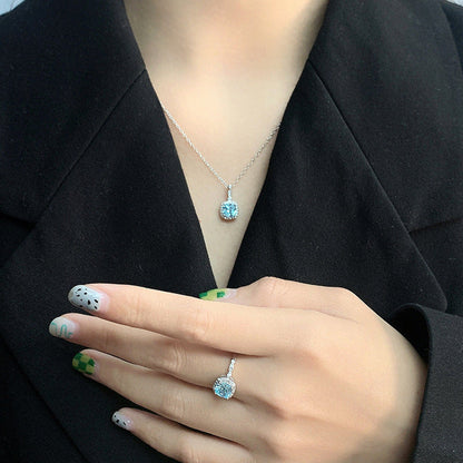 “Ocean Lumière” 925 Sterling Silver Blue Zircon Halo Jewelry Set