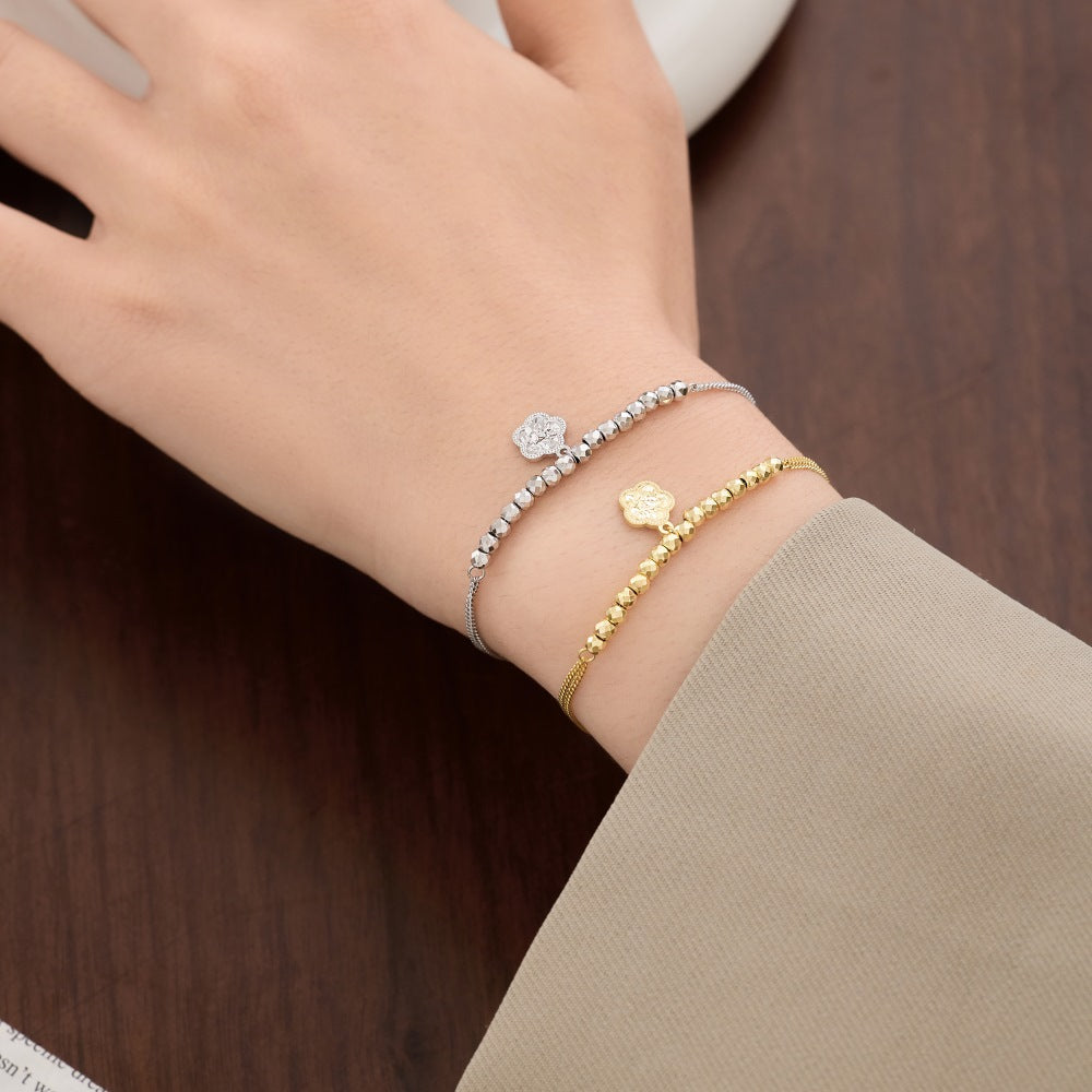 “Blossom Fortune” 925 Sterling Silver Lucky Flower Charm Bracelet