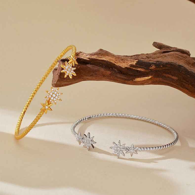 "Celestial Glow" 925 Sterling Silver Starburst Twist Bangle