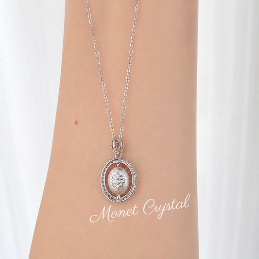 “Turning Point” S925 Sterling Silver Topaz Rotating Pendant Necklace