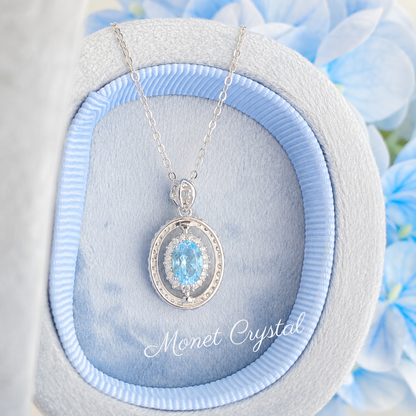 “Turning Point” S925 Sterling Silver Topaz Rotating Pendant Necklace